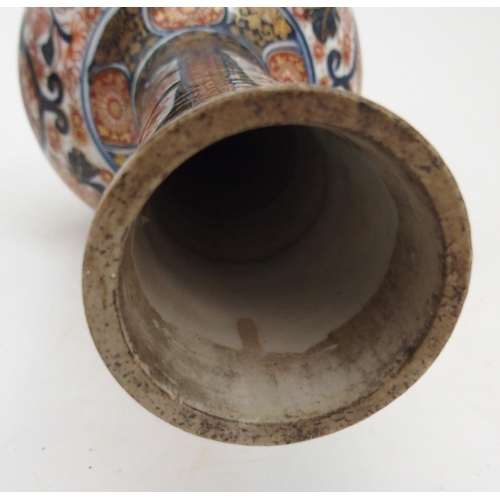 18 - AN IMARI BOTTLE SHAPED VASE