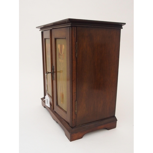 244 - A MAHOGANY ART NOUVEAU SMOKER CABINET