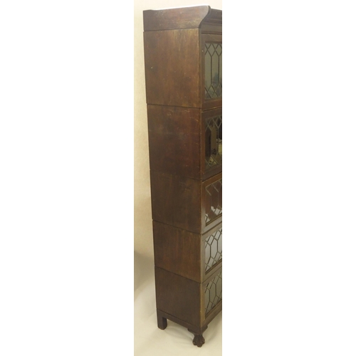 397 - A MAHOGANY LEADED GLASS SECTIONAL BOOKCASE