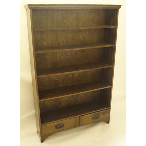 403 - AN OAK OPEN BOOKCASE