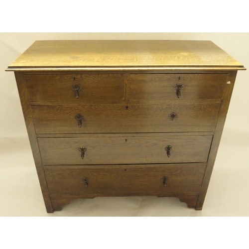 404 - AN OAK CHEST OF DRAWERS