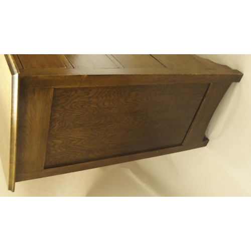 404 - AN OAK CHEST OF DRAWERS