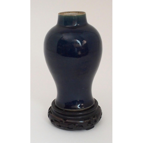 41 - A CHINESE BLUE MONOCHROME BALUSTER VASE