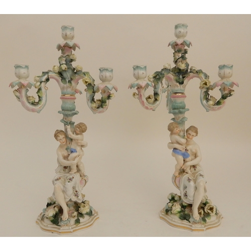 419 - A PAIR OF CONTINENTAL FIGURAL CANDELABRA