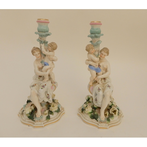 419 - A PAIR OF CONTINENTAL FIGURAL CANDELABRA