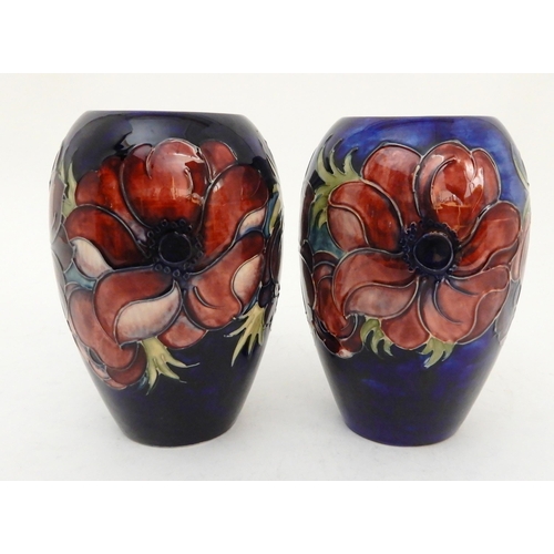 435 - TWO SIMILAR MOORCROFT ANEMONE PATTERN VASES