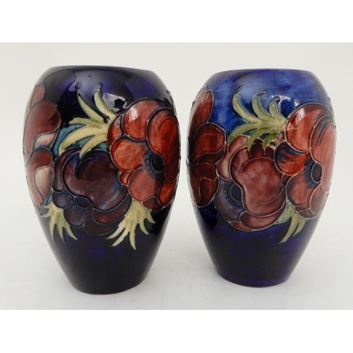 435 - TWO SIMILAR MOORCROFT ANEMONE PATTERN VASES