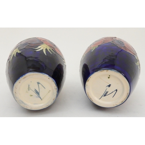 435 - TWO SIMILAR MOORCROFT ANEMONE PATTERN VASES