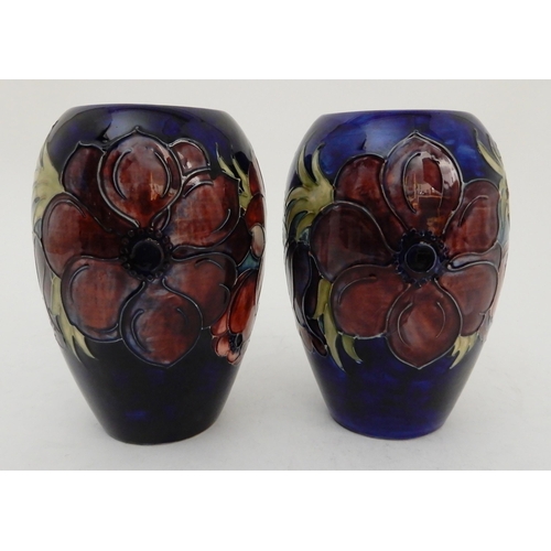 435 - TWO SIMILAR MOORCROFT ANEMONE PATTERN VASES