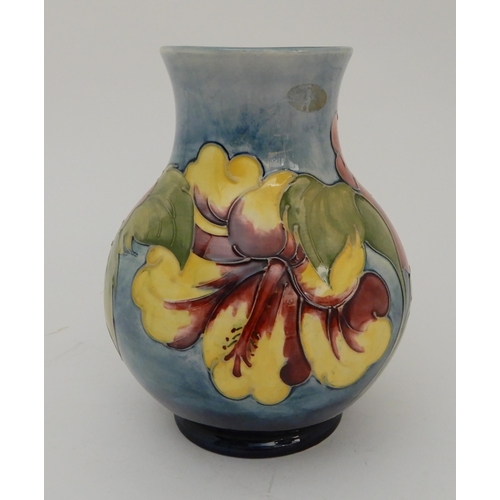 454 - A LIMITED EDITION MOORCROFT HIBISCUS PATTERN VASE