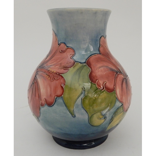 454 - A LIMITED EDITION MOORCROFT HIBISCUS PATTERN VASE