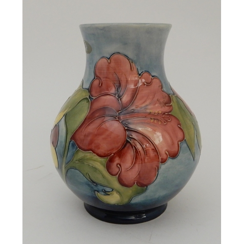 454 - A LIMITED EDITION MOORCROFT HIBISCUS PATTERN VASE