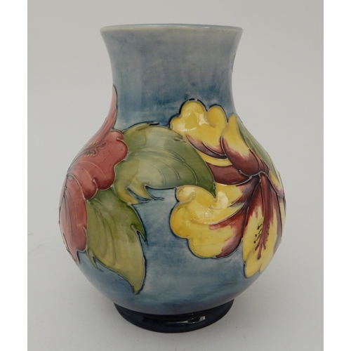 454 - A LIMITED EDITION MOORCROFT HIBISCUS PATTERN VASE