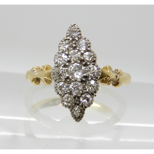 550 - AN 18CT GOLD MARQUIS DIAMOND CLUSTER RING