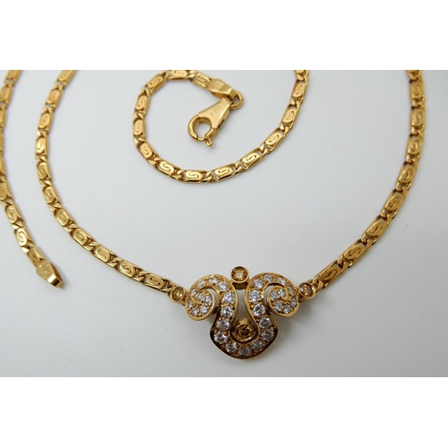 552 - AN 18CT GOLD ITALIAN MADE YELLOW AND WHITE DIAMOND NECKLACE