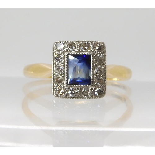 556 - AN 18CT GOLD SAPPHIRE ND DIAMOND RING