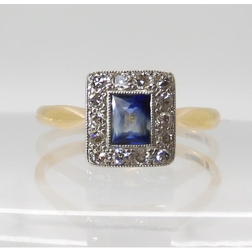 556 - AN 18CT GOLD SAPPHIRE ND DIAMOND RING