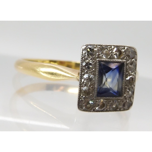 556 - AN 18CT GOLD SAPPHIRE ND DIAMOND RING