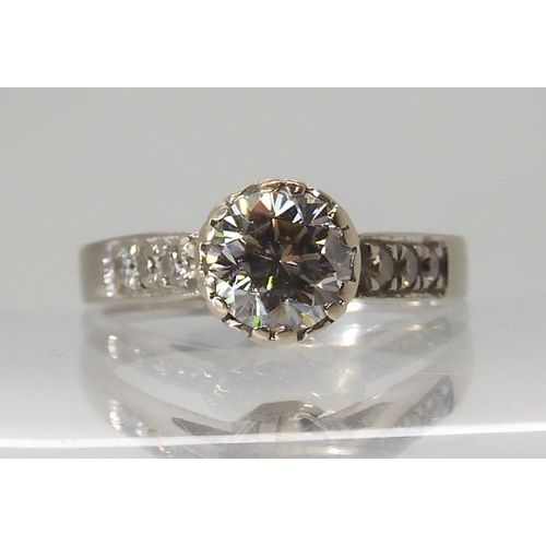 559 - AN 18CT WHITE GOLD DIAMOND RING