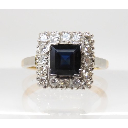 562 - AN 18CT GOLD AND PLATINUM SAPPHIRE AND DIAMOND RING