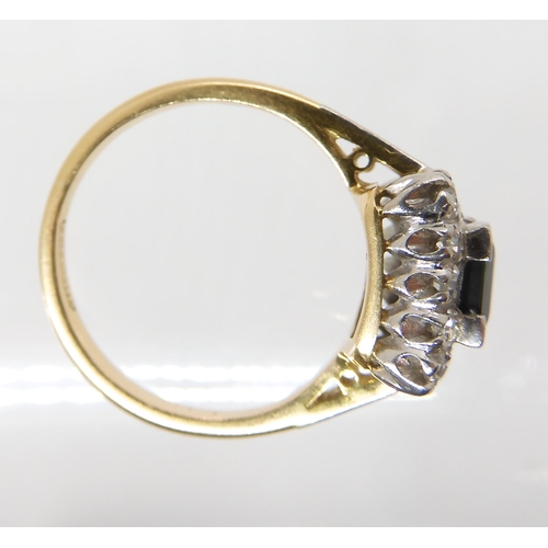 562 - AN 18CT GOLD AND PLATINUM SAPPHIRE AND DIAMOND RING