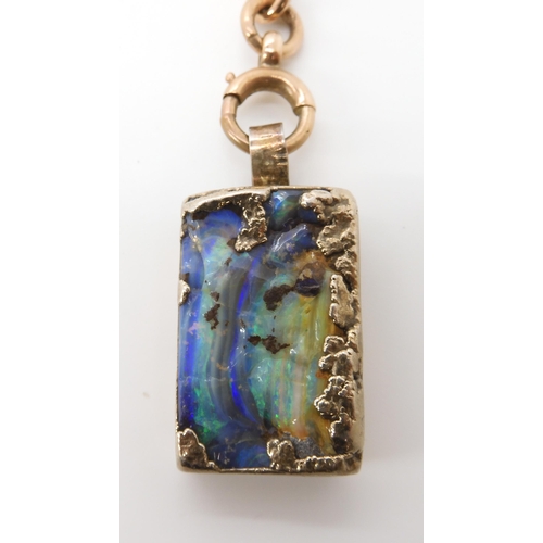 568 - A 9CT FOB BROOCH WITH A OPAL MATRIX PENDANT