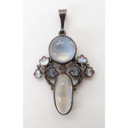 571 - A MOONSTONE AND ENAMEL PENDANT IN THE STYLE OF JESSIE M. KING