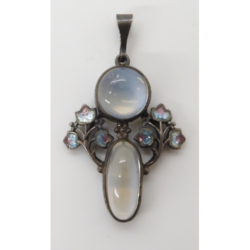 571 - A MOONSTONE AND ENAMEL PENDANT IN THE STYLE OF JESSIE M. KING