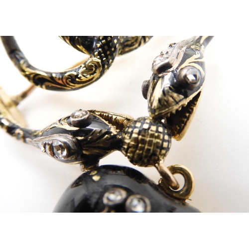 579 - AN EARLY VICTORIAN SERPENT MOURNING BROOCH