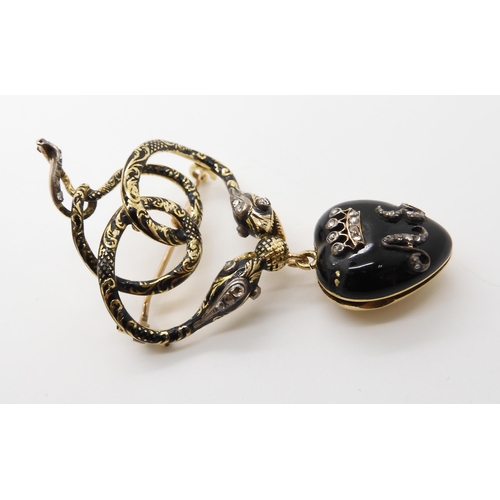 579 - AN EARLY VICTORIAN SERPENT MOURNING BROOCH