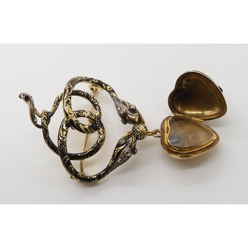 579 - AN EARLY VICTORIAN SERPENT MOURNING BROOCH