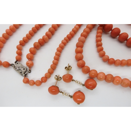 583 - CORAL NECKLACES AND EARRINGS