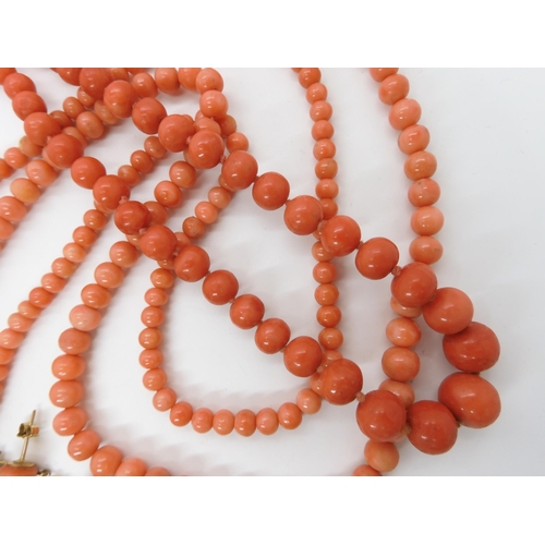 583 - CORAL NECKLACES AND EARRINGS