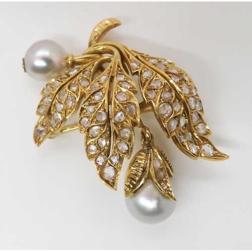 586 - A BRIGHT YELLOW METAL PEARL AND DIAMOND BROOCH