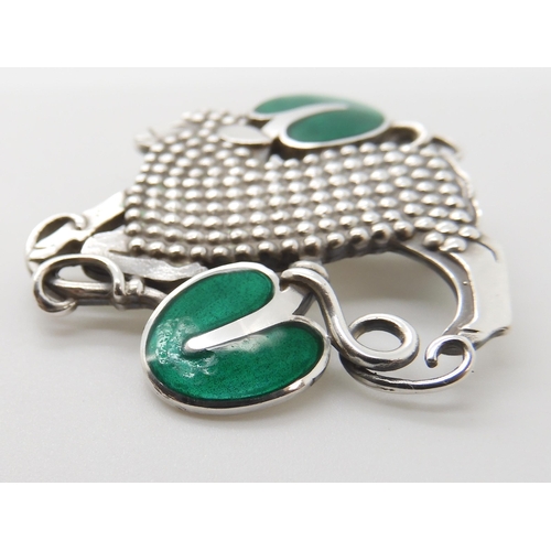 598 - A SILVER GEORG JENSEN LAMB AND IVY BROOCH