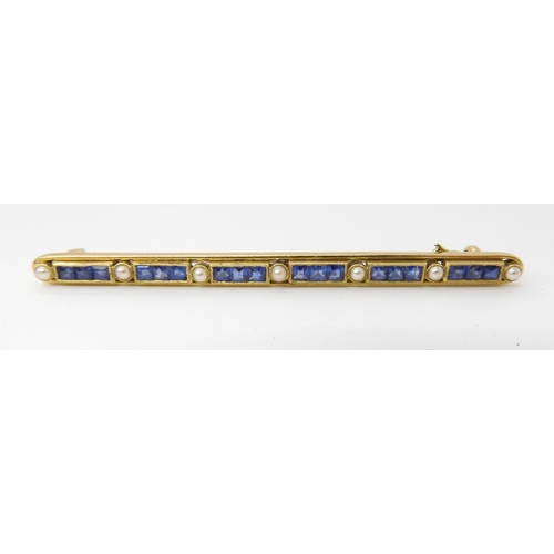 602 - A 15CT GOLD BLUE GEM AND PEARL BROOCH BY SAUNDERS & SHEPHERD