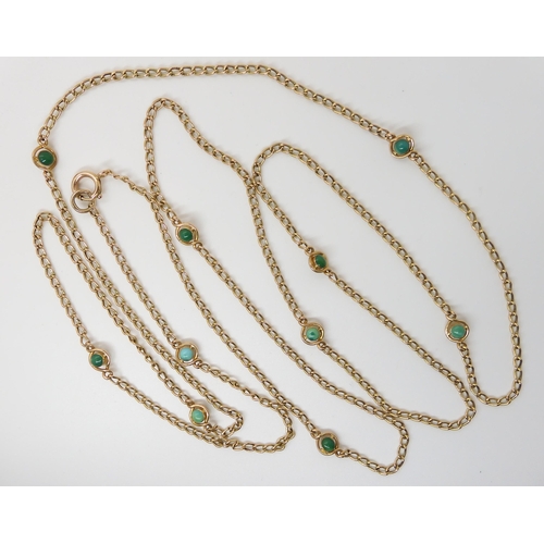 607 - A LONG YELLOW METAL CHAIN SET WITH TURQUOISE