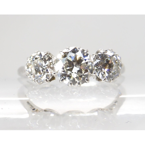 608 - AN OLD CUT THREE STONE DIAMOND RING