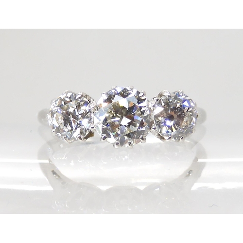 608 - AN OLD CUT THREE STONE DIAMOND RING