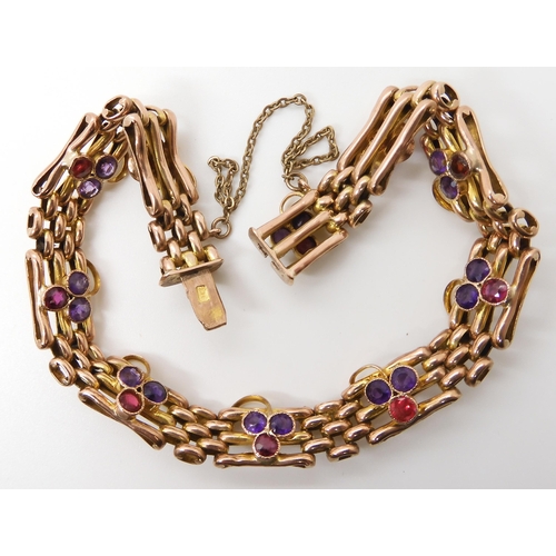 623 - A 9CT GOLD GARNET AND AMETHYST EDWARDIAN BRACELET