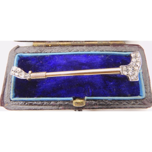 629 - A DIAMOND SET RIDING CROP BROOCH