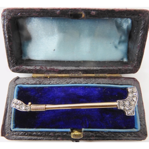 629 - A DIAMOND SET RIDING CROP BROOCH