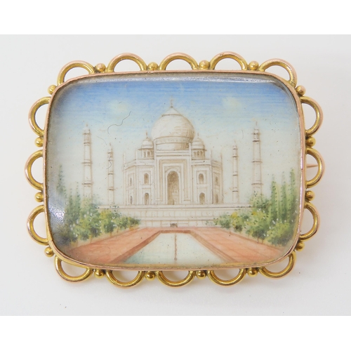 631 - A YELLOW METAL BROOCH MOUNTED MINIATURE OF THE TAJ MAHAL