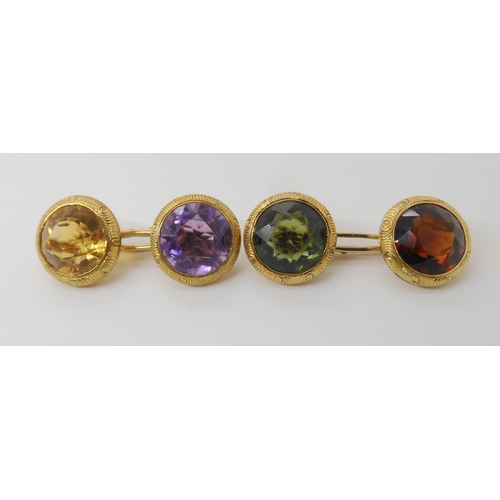 633 - A PAIR OF 14K GOLD TUTTI FRUITI CUFFLINKS