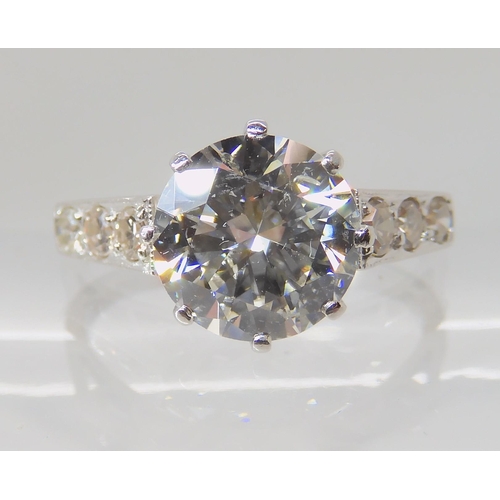 634 - A SUBSTANTIAL PLATINUM AND DIAMOND RING