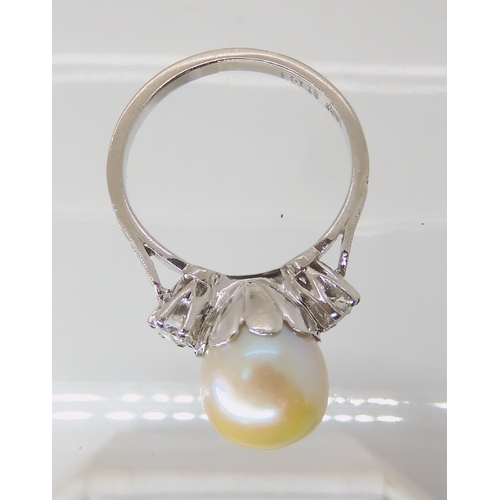 635 - AN 18CT WHITE GOLD PEARL AND DIAMOND RING