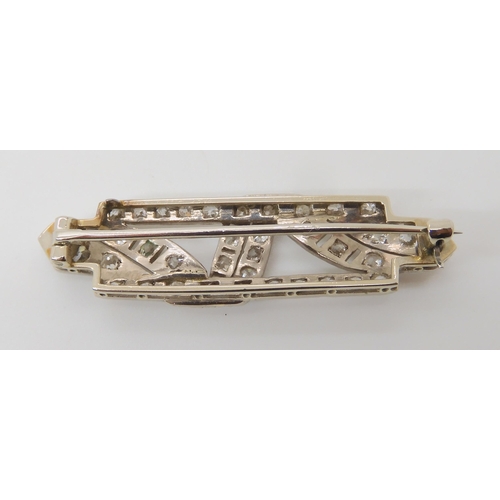 637 - AN 18CT GOLD AND PLATINUM DIAMOND ART DECO BROOCH