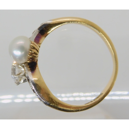 640 - AN 18CT DIAMOND AND PEARL RING