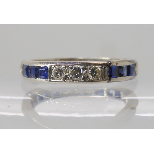 645 - A SAPPHIRE AND DIAMOND ETERNITY RING