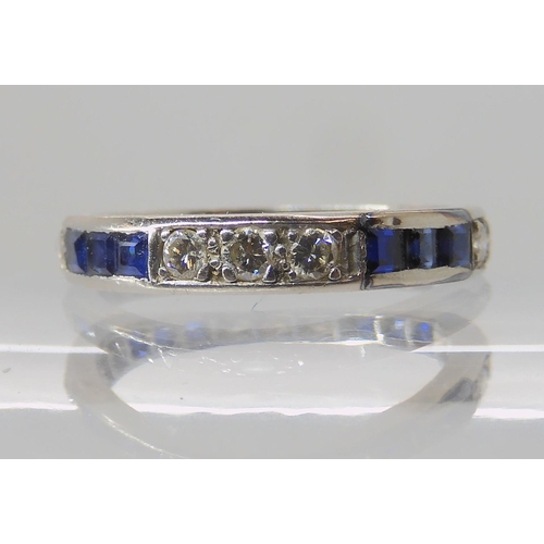 645 - A SAPPHIRE AND DIAMOND ETERNITY RING